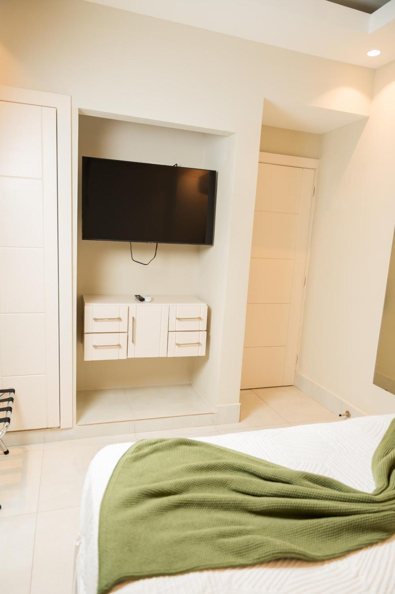 Hotel Stay Here Suites Santo Domingo Rum bild
